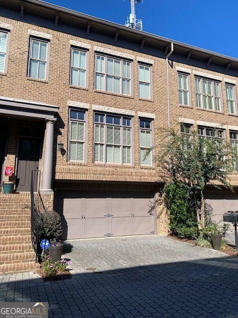 Photo of 810 Highland Green Way NE, Atlanta, GA 30306 (MLS # 10812794)