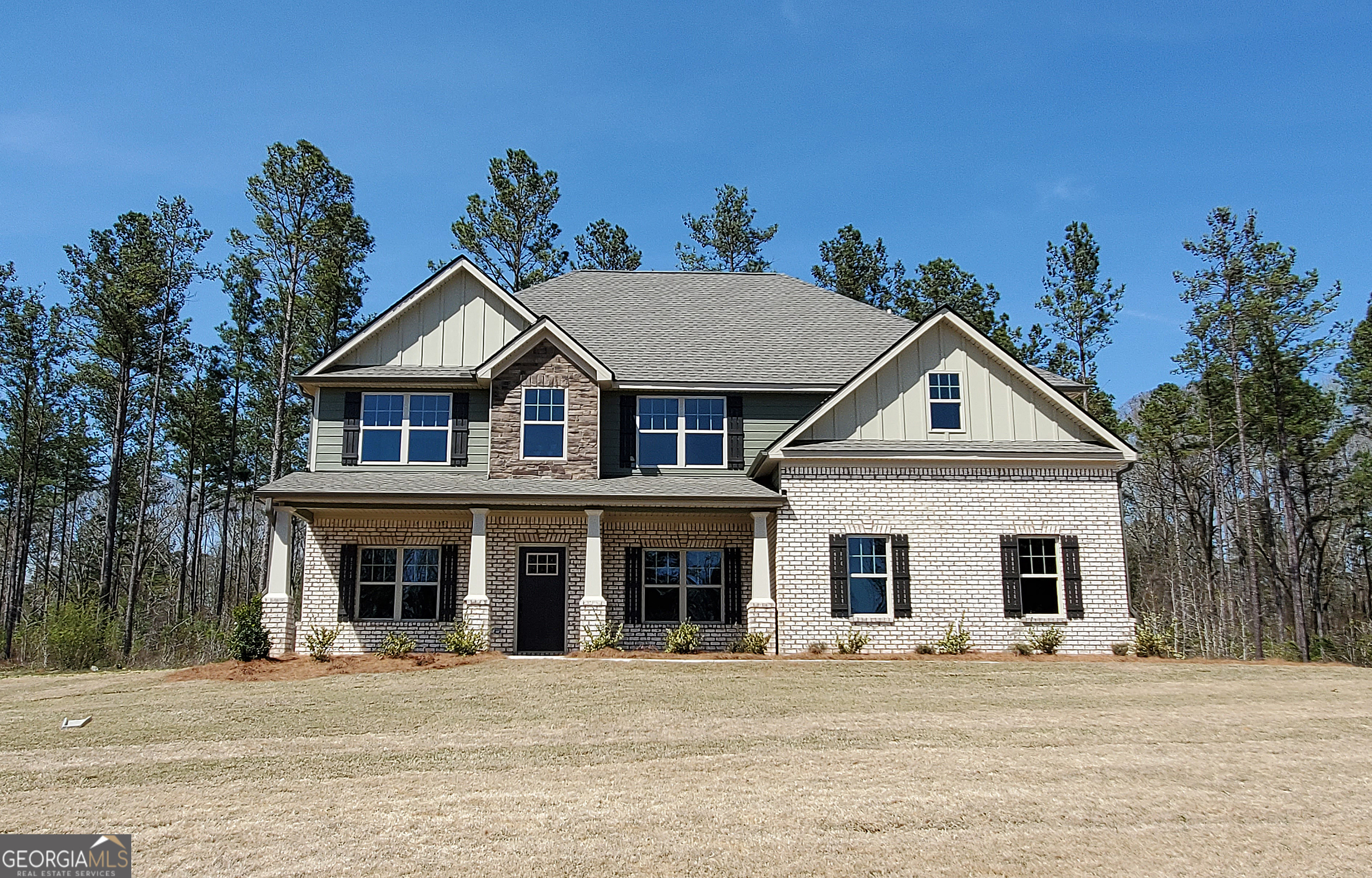 Lot 22A | The Oakhurst by Capshaw Homes Available December 2025 Nestled on an expansive, level homesite of approximately one acre, The Oakhurst is a stunning statement of timeless craftsmanship and refined living. As you step through the grand entrance, you're welcomed by floor-to-ceiling columns and a soaring two-story family room that bathes the space in natural sunlight-setting the tone for a home designed to impress. An open-concept layout elevates everyday living and entertaining, featuring gleaming hardwood floors, spacious secondary bedrooms, and a chef-inspired kitchen complete with an oversized island that seamlessly flows into the inviting family room. A gracious upper-level loft offers additional flexibility, perfect for a second gathering space or private retreat. The home's exterior showcases enduring elegance with a brick and stone front facade complemented by true Hardie Plank siding-a nod to both beauty and durability. Every inch of this home's heated space has been thoughtfully maximized for comfort, functionality, and style. Community Highlights - Greystone: Experience life in an established, amenity-rich enclave with tree-lined streets, sidewalks, a private clubhouse, resort-style pool, tennis courts, and high-speed fiber internet. Capshaw Homes are constructed with uncompromising quality and attention to detail. Each residence includes a 2-10 Homebuyers Warranty, offering enduring peace of mind. Additional luxury finishes include granite countertops throughout, coffered ceilings, designer recessed lighting, an irrigation system, and more.