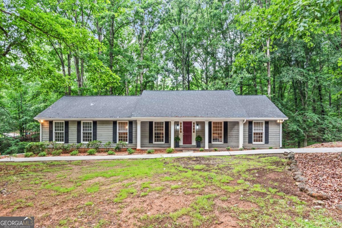 Welcome to 161 Pinecrest Terrace - a beautifully maintained 3BR/3BA ranch nestled on a private 1.29-acre lot in the heart of Athens' desirable Forest Heights neighborhood. This charming home features an open layout with two cozy fireplaces, spacious living and dining areas, and a dedicated office/parlor space. Enjoy a well-appointed kitchen with ample cabinet storage, and a large laundry/mudroom for everyday convenience. Outdoor living shines with a welcoming front porch and screened rear porch overlooking a level, fenced backyard. The property includes a 2-car garage and extended driveway with parking for up to 8 vehicles. Located just minutes from UGA, downtown Athens, shopping, dining, and Piedmont Hospital. Don't miss this rare blend of space, comfort, and location!
