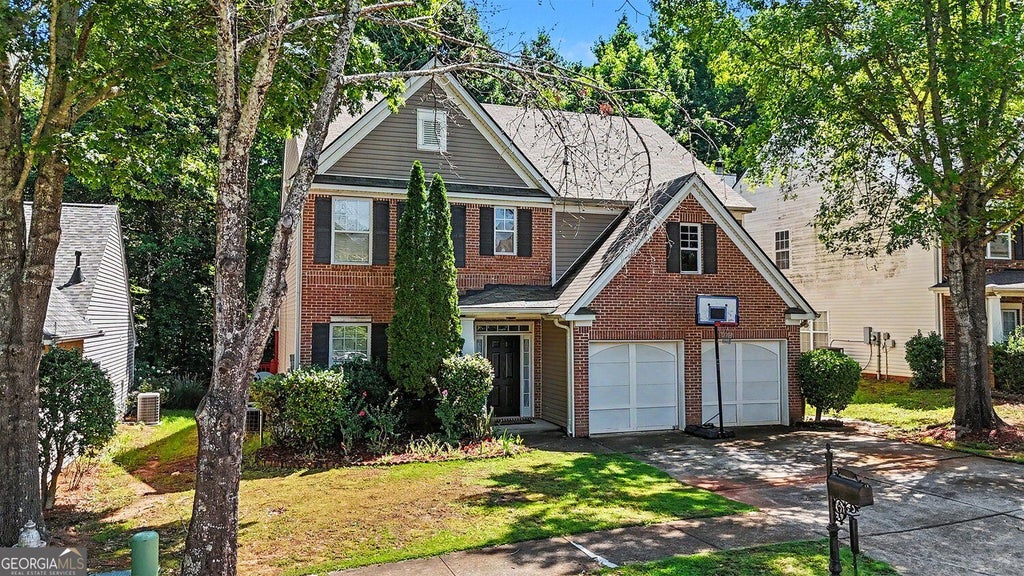 Photo of 6699 Island Pointe Drive, Buford, GA 30518 (MLS # 10857490)