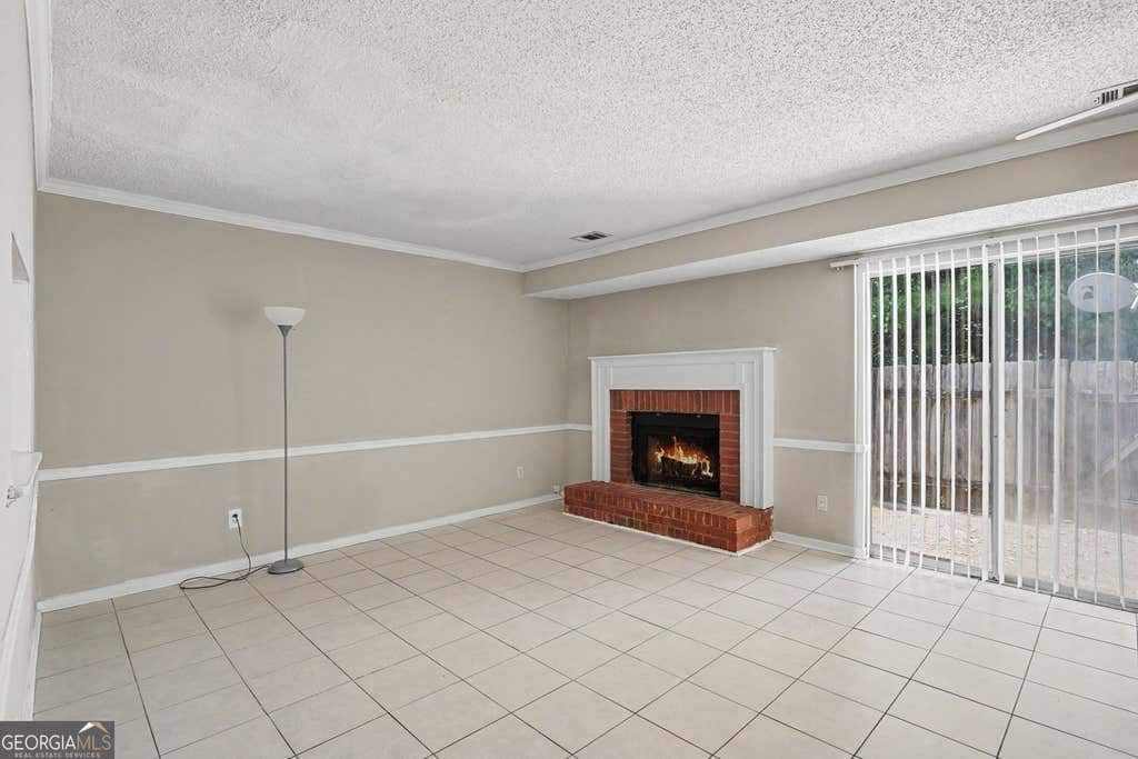 Photo of 8547 Jamestown Way, Jonesboro, GA 30238 (MLS # 10830046)
