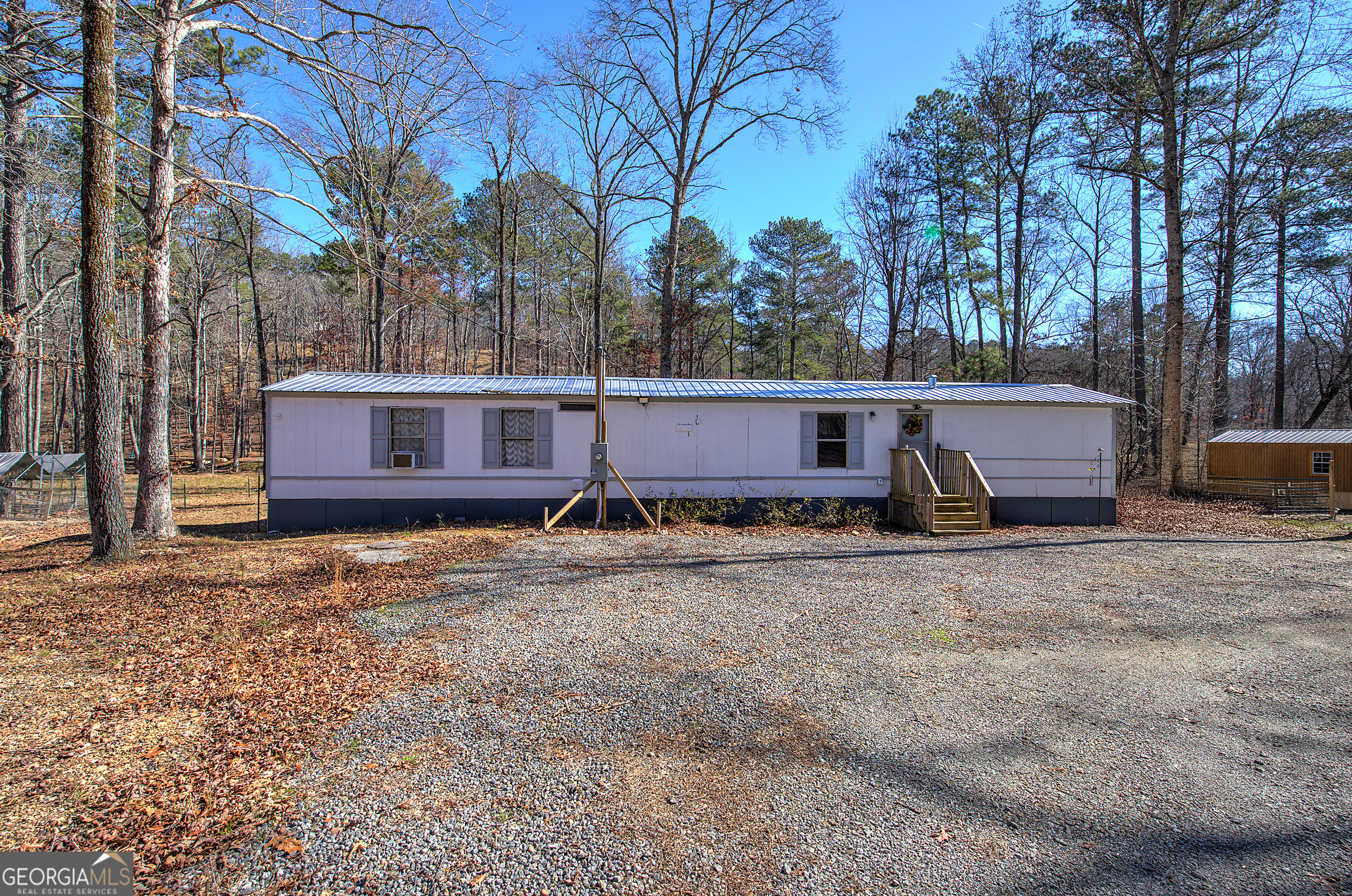 Take a look at this very unique, one of a kind property on almost 17 acres with 2 homes!!! One could be income producing or perfect for multiple families. One home is a new construction that needs to be completed, new gravel drive, hydroseeding complete, gorgeous views with lots of wildlife and beautiful creek that flows between the homes with a bridge, hunting trails, amazing landscaping, new appliances, new tin roof, soaking tub and tons of potential to make this secluded beauty what you want.
