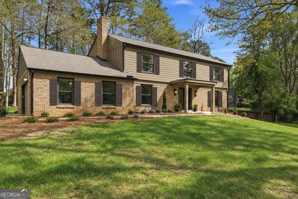 Photo of 3829 Fox Hills Drive SE, Marietta, GA 30067 (MLS # 10842907)
