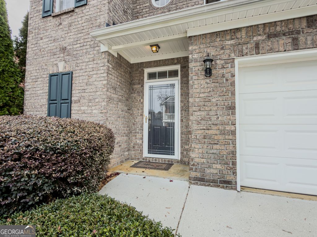 Photo of 1935 Hickory Station Circle, Snellville, GA 30078 (MLS # 10661701)