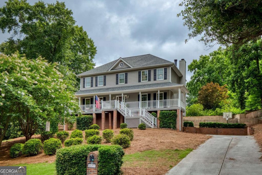 Photo of 4697 Woodstone Lane, Peachtree Corners, GA 30096 (MLS # 10789787)