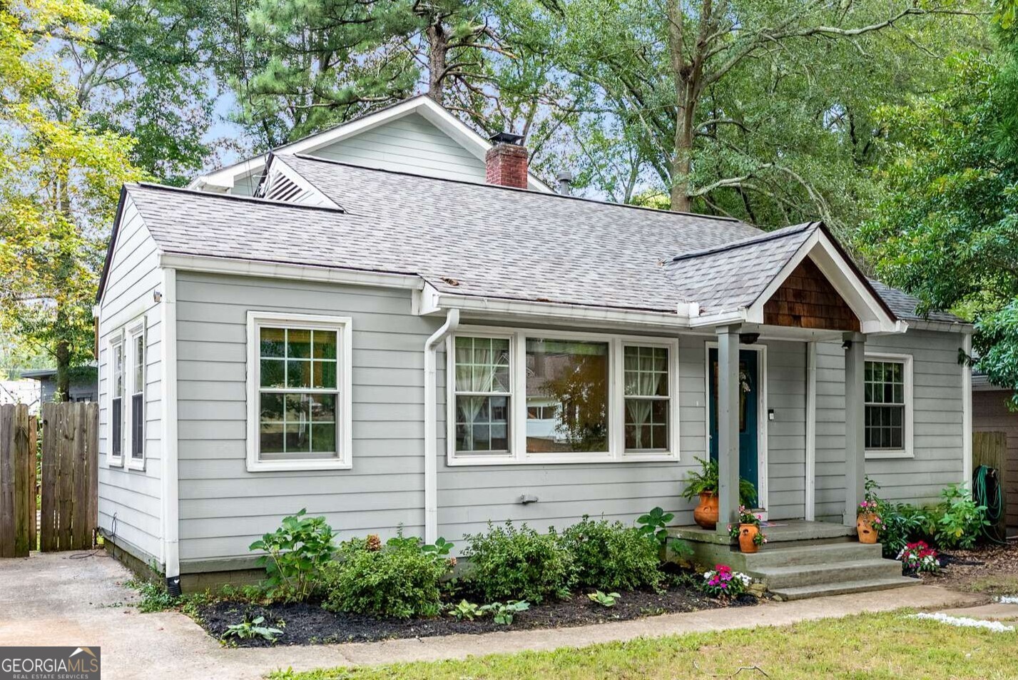This beautiful home is located in a quiet neighborhood, just a few streets from East Lake Golf Club, and 3 minutes from parks, restaurants, and cozy coffee shops. It blends everyday comfort with upscale living. The flat, fenced yard is perfect for play or pets, along with an out-building for all your garden tools. Enjoy the granite countertops and breakfast bar at the heart of the home with the stainless appliances, double oven, and a sleek, high-tech fridge, which even lets you peek inside without opening the door! The spacious master suite is your personal escape, complete with its own deck, ideal for sipping morning coffee in peace. The spa-inspired bathroom features a sculpted, stand-alone soaking tub that transforms your evening routine into a five-star experience, plus a shower with eight shower heads that feels more like a luxurious car wash than a rinse. You'll love the screened-in porch for bug-free evenings, two decks for entertaining, and a dedicated reading nook for the kids. Don't miss this rare gem - just a few streets from everything you love in Atlanta.