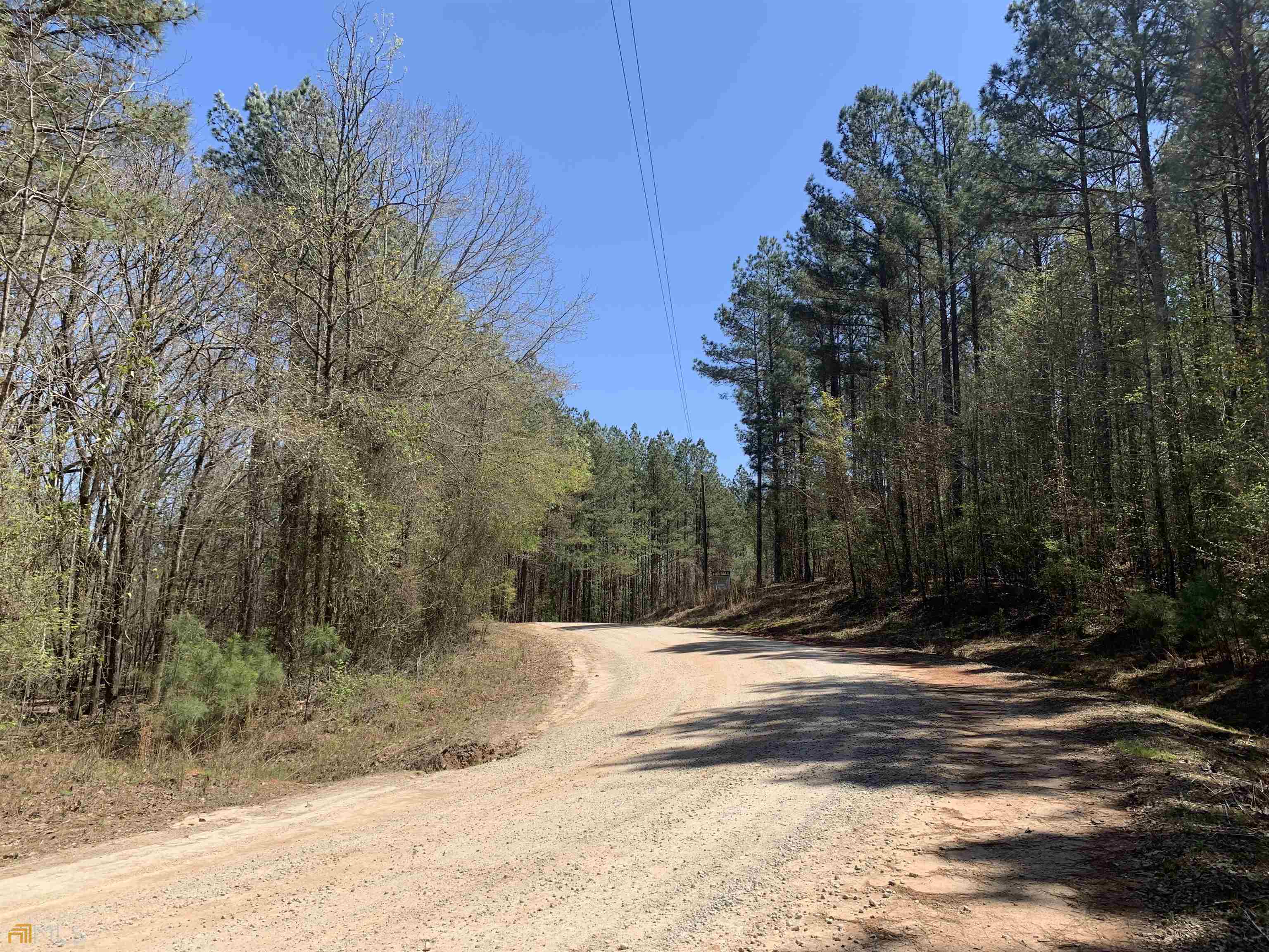 Build your Cabin or Country Home within commuting distance to UGA/Athens! The Smith Tract offers the peace and quiet that comes with living in the country along with the added convince of being close to enough to work in Athens. The property features mature pine timber (ready for a thinning) with a creek. The property is located on Gene Smith Road in Oglethorpe County. Call Jesse 706-614-4855