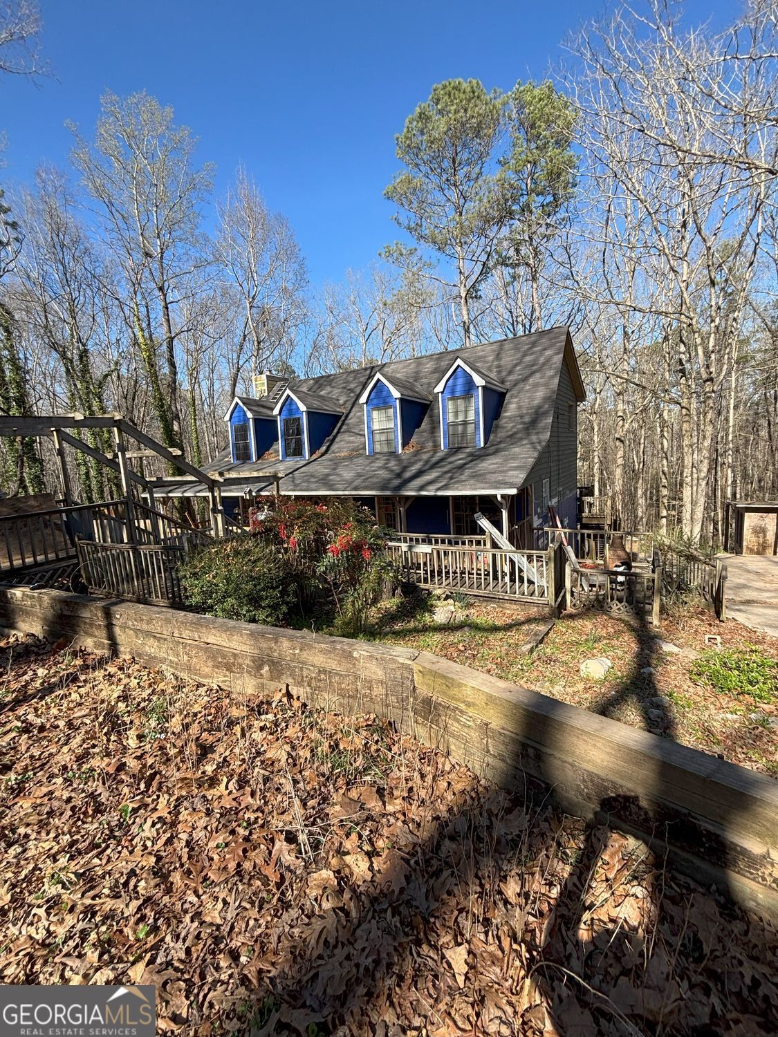 Investor Special with tons of potential in Ball Ground, GA! Located in the peaceful Eagles Nest Ridge community, this 3-bedroom, 2-bathroom home sits on just over 2 acres, offering endless possibilities for renovation and value-add improvements. The current owner has already started repairs and modifications-now it's your opportunity to complete the vision and bring this property to its full potential! With additional storage buildings/workshops, this property is a fantastic opportunity for investors looking to add extra amenities or expand their portfolio. Enjoy the quiet living of rural Ball Ground while maximizing your investment. Being sold "as-is" with no warranty, this vacant property is ready for your ideas and improvements. Don't miss out on this prime investment opportunity!