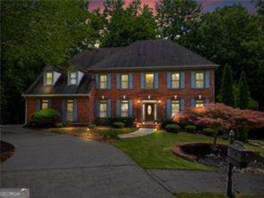 If you love the outdoors, this is the home for you! Situated on a serene half-acre wooded lot with a babbling creek, this stunning 4-sided brick traditional offers three expansive levels of completely private outdoor living-you'll feel like you're tucked away in the mountains, right in the coveted Chartwell neighborhood.    Situated on one of the most private cul-de-sac lots, the home boasts a 3-car side-entry garage, a spacious family room with a 2-story stacked stone fireplace, a beautifully renovated kitchen with a large island, stainless steel appliances, generous breakfast area, and access to the covered back porch, as well as a cozy keeping room with gas log fireplace.    The main level also includes a formal dining room and a flexible living room/study with a closet and full bath access-ideal for a guest room or home office.    Upstairs, the enormous primary suite impresses with a tray ceiling, spa-like ensuite featuring dual vanities, whirlpool tub, large shower, and a bonus sitting room/nursery/office, plus private access to the top-floor covered porch. The upper level also offers a versatile loft area and three additional spacious bedrooms-one with a private ensuite, the other two sharing a Jack-and-Jill bath.    The full daylight basement includes a third fireplace and opens to a beautiful brick patio, offering endless potential for customization.    Community & Location:  Chartwell residents enjoy top-notch amenities including a Clubhouse, Pool, Tennis Courts, Pickleball, Lake, and Playground, with path access to Newtown Park, which features over 2 miles of trails, the Veterans Memorial Walk, Park Place Senior Center, Burkhalter Amphitheater, and a 1-acre dog park with turf, sprinklers, and obstacle courses. Newtown Recreation offers a variety of youth sports including soccer, lacrosse, baseball, and adaptive recreation.    This unbeatable location is convenient to top public & private schools, GA-400, Historic Roswell, Avalon, and the Chattahoochee River, with direct access to shopping and dining.
