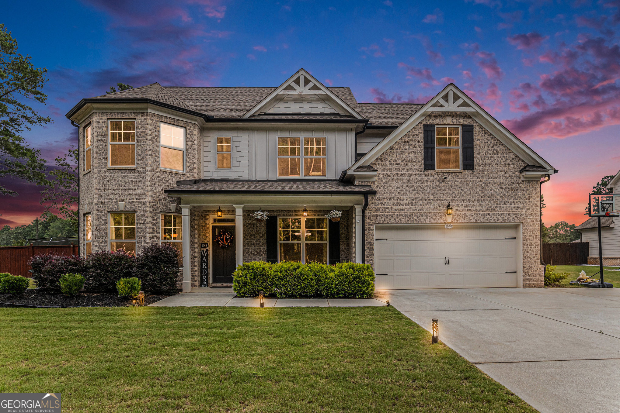 Built in 2021, this stunning 5-bedroom, 3.5-bath home offers the perfect blend of space, comfort, and privacy. The primary suite is conveniently located on the main level, and a dedicated office provides flexibility as a potential 6th bedroom. The home features a formal dining room, spacious living room, and a separate eat-in kitchen with white cabinetry and granite countertops. A mudroom adds everyday convenience, while the enclosed sunroom with fireplace and ceiling fan creates the perfect indoor/outdoor retreat. Situated on a corner lot of nearly an acre, this property boasts a massive fenced backyard with a side-swing gate for large vehicle access, as well as a huge front yard. With no HOA restrictions, you'll enjoy the freedom to truly make this property your own. Tucked away for privacy yet ideally located - you're just minutes from grocery shopping and only 9 miles from the Mall of Georgia.