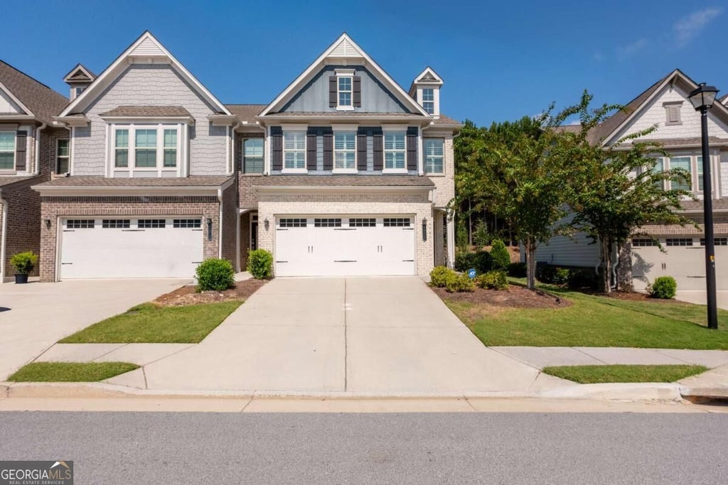 Photo of 6388 Lanier Harbor Landing, Buford, GA 30518 (MLS # 10848087)