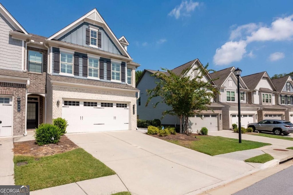 Photo of 6388 Lanier Harbor Landing, Buford, GA 30518 (MLS # 10848087)