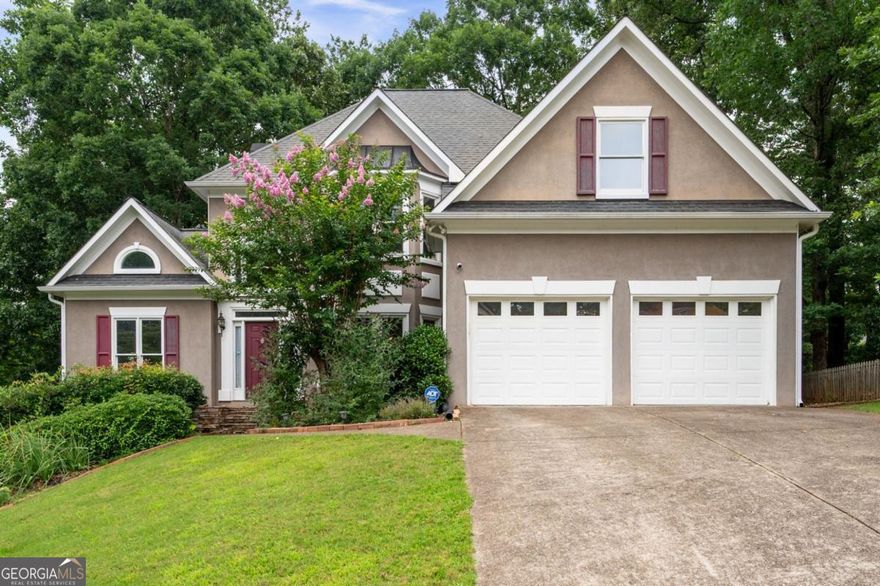 Welcome to this beautifully maintained 4-bedroom, 3.5-bath home nestled in the highly sought-after Sandy Plains community. Offering just over 3,600 square feet of sophisticated living space, this home seamlessly combines timeless charm with modern upgrades in an unbeatable location. From the moment you enter, you'll be greeted by an abundance of natural sunlight and thoughtful design throughout. The inviting front sitting room provides a perfect space for a home office or cozy den and is conveniently located across from the elegant formal dining room-ideal for hosting gatherings. The heart of the home is the expansive great room with a fireplace, open to the stunning gourmet kitchen featuring granite countertops, newer cabinetry, stainless steel appliances, an eat-in island, and a charming keeping room with its own gas log fireplace-creating a warm and welcoming space for everyday living. Upstairs you'll find all four spacious bedrooms, a well-appointed laundry room, and a recently renovated owner's suite that serves as a true retreat. The primary bathroom boasts tray ceilings, dual vanities with quartz countertops, a beautifully tiled walk-in shower, a soaking tub, and a generous walk-in closet with custom built-ins. The secondary Jack and Jill bathroom has also been updated with stylish new vanities, sleek quartz countertops, and modern fixtures-offering both functionality and flair. The powder room on the main level has been similarly upgraded, creating a cohesive, polished feel throughout the home. The fully finished daylight basement offers incredible flexibility with a large rec room, bonus room, a potential guest suite, full bathroom, and a dedicated workshop/storage area-perfect for multi-generational living, hobbies, or home gym. Step outside to a landscaped backyard complete with a deck for entertaining and a cozy fire pit area-an ideal setting for relaxing evenings under the stars. Located in a vibrant HOA community, residents enjoy access to a large Olympic-sized pool, tennis courts, playground, and a beautiful clubhouse perfect for special events and celebrations. With shopping, dining, and entertainment just minutes away-and quick access to I-75 and I-575-this home offers the perfect balance of convenience and comfort, just a short drive to both Woodstock and Roswell. Don't miss the opportunity to own this exquisite home in one of East Cobb's most desirable neighborhoods!