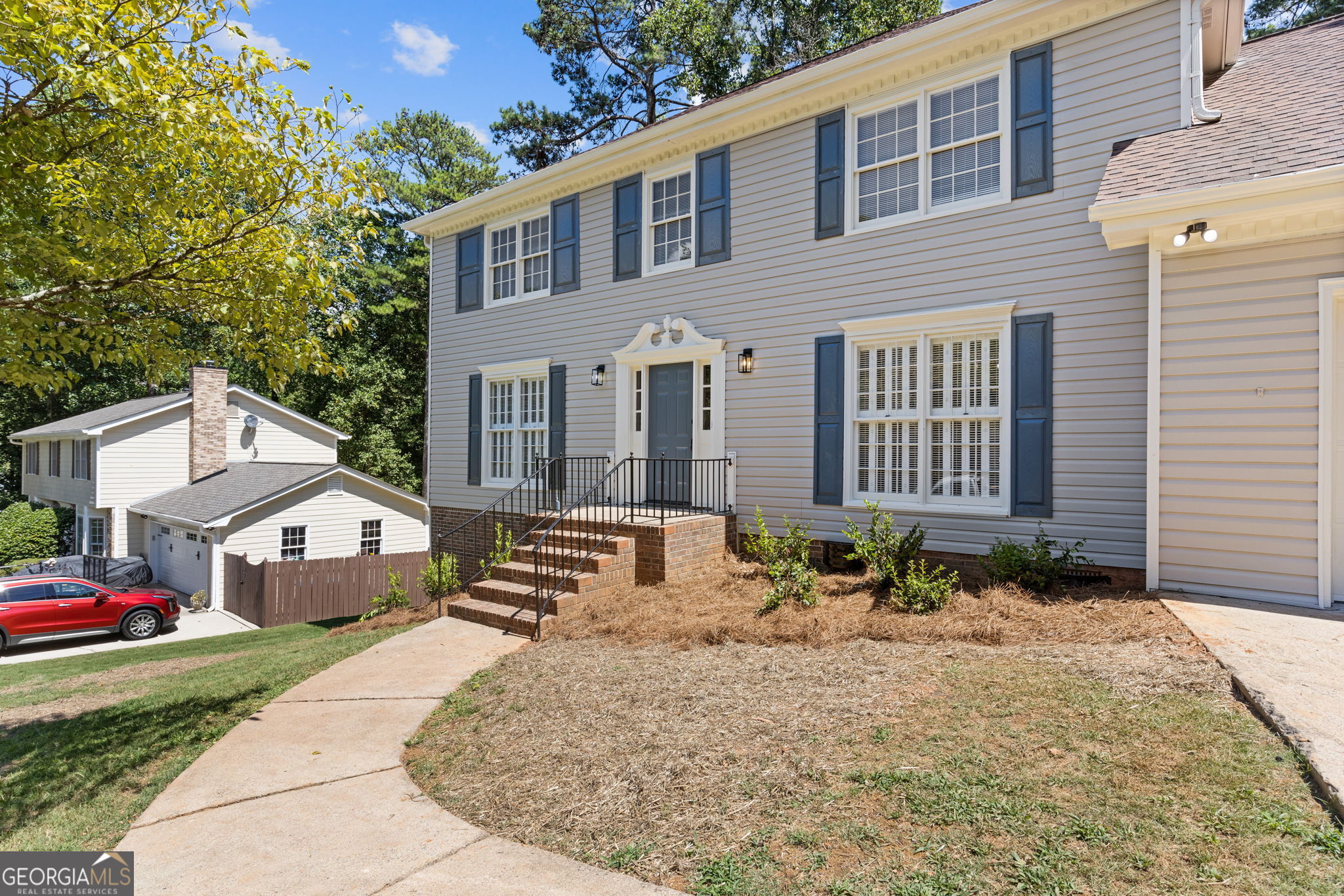 This beautifully updated 4-bedroom, 2.5-bath residence blends modern upgrades with timeless charm-located in a quiet neighborhood within the highly sought-after Parkview High School district. Step inside to discover brand new hardwood flooring throughout and and plush carpet in the spare bedrooms, fresh interior and exterior paint, and a thoughtful layout perfect for both everyday living and entertaining. The kitchen features quartz countertops, new white cabinetry, and new Stainless Steel appliances , while the bathrooms have been outfitted with premium Delta and American Standard fixtures. No detail has been overlooked in the comprehensive renovation: *Brand new Hardwoods on Main Floor and Primary Bedroom *Brand new carpet in the 3 spare bedrooms *Electrical system fully upgraded, including new fixtures, outlets, receptacles, and devices *Plumbing system updated throughout *Septic tank pumped, with tail out replaced for peace of mind *Trees cut and professionally pruned, enhancing curb appeal *HVAC serviced, with new filters, a new thermostat, and sump pump replacement *Crawl space cleaned and encapsulated *Existing waterproofing system serviced *New garage door installed Enjoy relaxing evenings on the screened-in back porch, overlooking a peaceful, private yard-perfect for entertaining or unwinding after a long day. Located just minutes from Main Street Lilburn and Lilburn City Park, this home is also close to schools, shopping, parks, trails, and recreation facilities. Commuting is a breeze with convenient access to Emory University, the CDC, and downtown Decatur. No HOA and no rental restrictions give you flexibility-whether you're looking for a personal residence, long-term investment, or future rental property. This move-in ready home is truly a rare find-offering the peace of mind of a full renovation with the charm of an established community.