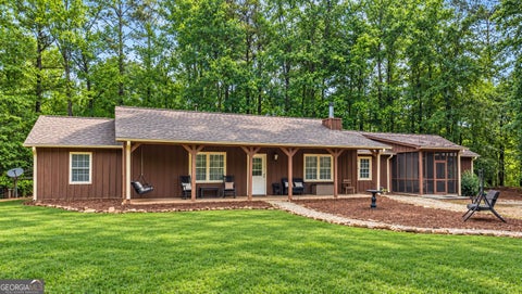 Photo of 712 Honeysuckle Lane, Temple, GA 30179 (MLS # 10840409)