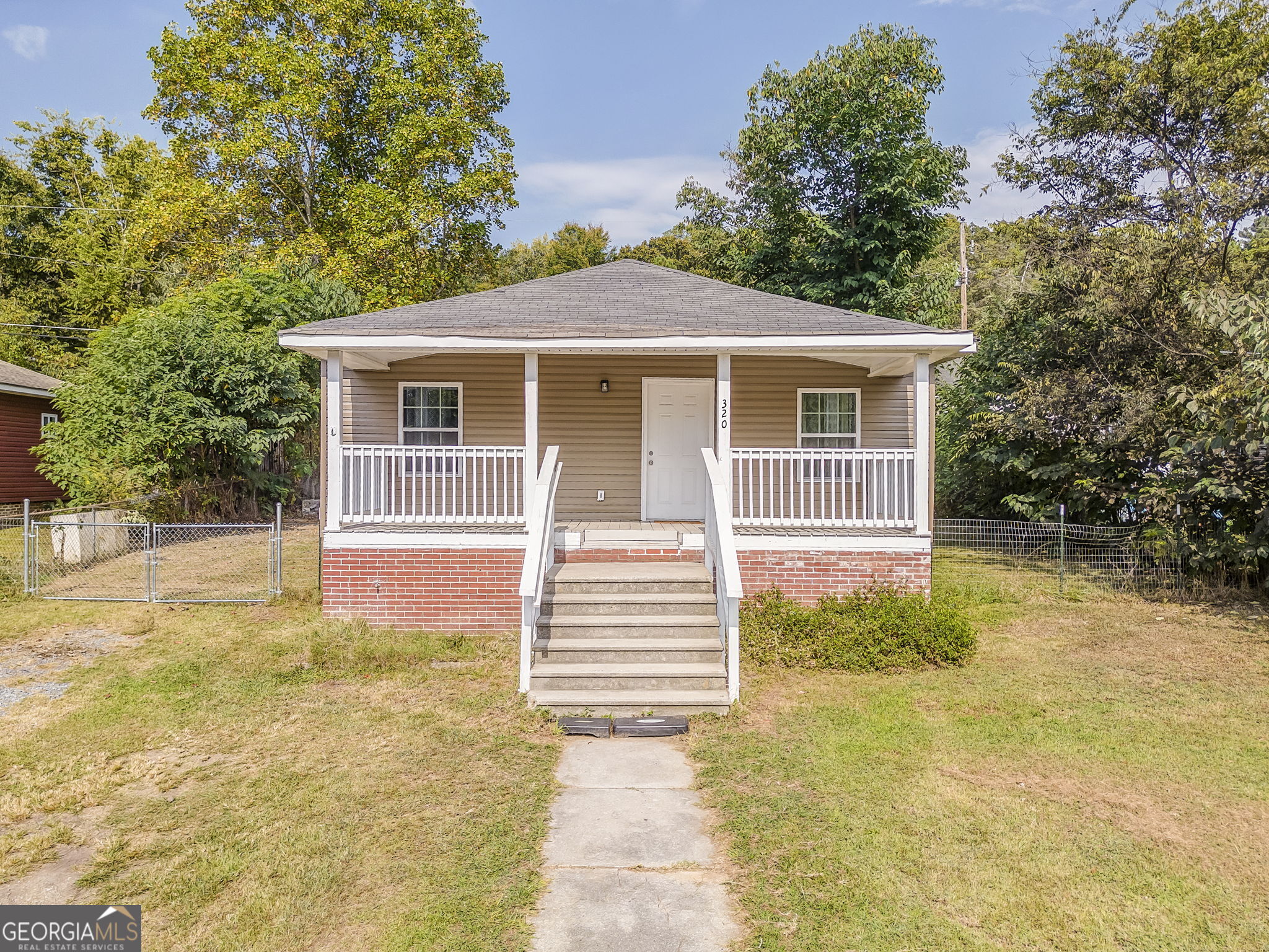 Totally remodeled 2 years ago, this 3 bedroom 2 bath home is a must see in the Shannon Village. Solid surface countertops and an open concept from the kitchen to the living room. The front porch offers ample space for seating and the park near by is just a short walk away. Call today for an appointment to see this cottage that is close to Rome & Calhoun!