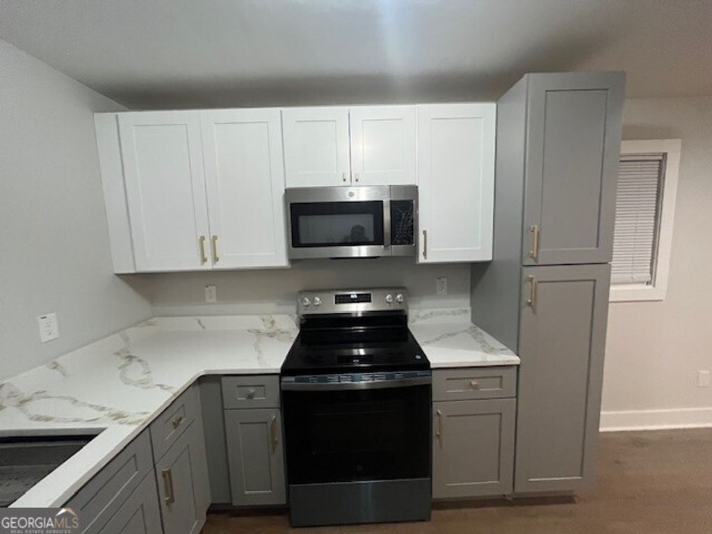 Photo of 635 Birchwood Lane SW, Marietta, GA 30060 (MLS # 10651391)