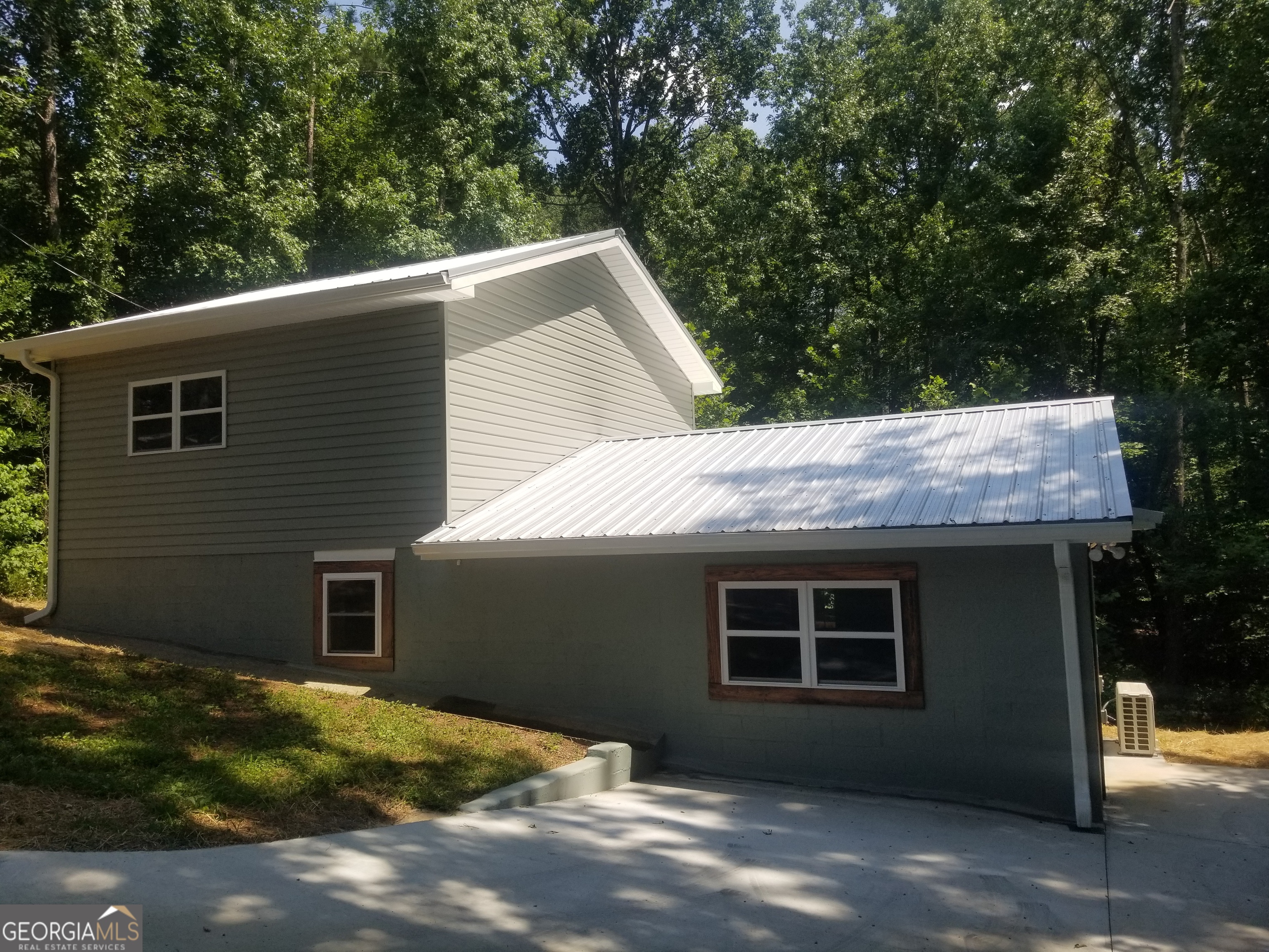 Buyer's loss can be your gain. Almost everything is new in this remodeled, updated home. New studs, new walls, new sheetrock, new plumbing, new electric, new floors, new fixtures, new HVAC, new cabinets, new paint...the list goes on and on. Perfect plan for roommates or two generation living. Two bedrooms, one bath, kitchen, and living area on main level. Upstairs space features one bedroom, one bathroom and open living area. Add a microwave and mini fridge and poof! - separate apartment living for teen or young adult. Convenient location in the ABC Triangle - one hour to Atlanta, GA, two hours to Birmingham, AL and three hours to Chattanooga, TN. Also convenient to Dallas, Rome, and Marietta, GA. Conventional financing or cash only. No VA, FHA or USDA. There are grant programs available for conventional financing. Call me to find out more.