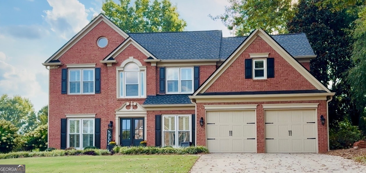 Welcome to your move-in ready home in one of South Forsyth's most sought-after communities! Lovingly owned by the same family for 23 years, this beautifully remodeled 4 bedroom, 2.5 bath home blends timeless charm with modern updates. This lovely Home features plantaton shutters throughout,new roof, windows, fresh interior & exterior paint,quartz countertops with designer backsplash and lighting. New striking double front doors open to a welcoming two-story foyer with gleaming hardwood floors that flow throughout the main level-including dining room, family room, kitchen, powder room and A versatile flex room just off the dining area that can serve as a breakfast nook or office. The heart of the home is a beautifully updated kitchen featuring brand-new quartz countertops,new oversized kithchen sink and stylish backsplash. This space opens seamlessly into a spacious, two-story family room, making it ideal for both entertaining and everyday living. New hardware on all interior/exterior doors and in the bathrooms add a touch of modern luxury. Upstairs, hardwood floors continue into the hallway and owner's suite, which features a trey ceiling and plenty of natural light.Three additional bedrooms with new carpet provide flexibility for family, guests, or playroom. Step outside to a stunning landscaped backyard filled with colorful annuals, perennials & shrubs plus oversized patio-an entertainer's dream! The location is unbeatable! Zoned for top-rated Lambert High School ,This community offers a spacious clubhouse for private parties and neighborhood celebrations, all with a low HOA.Minutes from Avalon, The Collection, endless restaurants, shopping, and the soon-to-open entertainment destination The Gathering. Convenient access to GA-400 makes commuting easy.