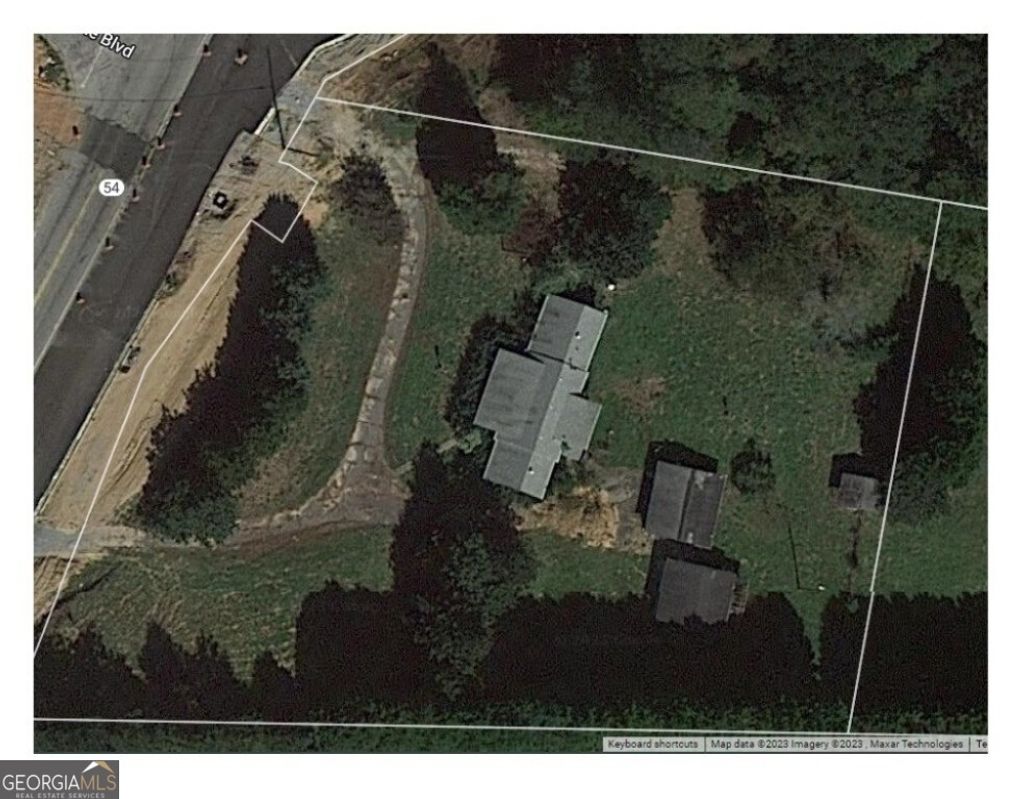 Photo of 8922 Hwy 54 W, Jonesboro, GA 30238 (MLS # 10656860)