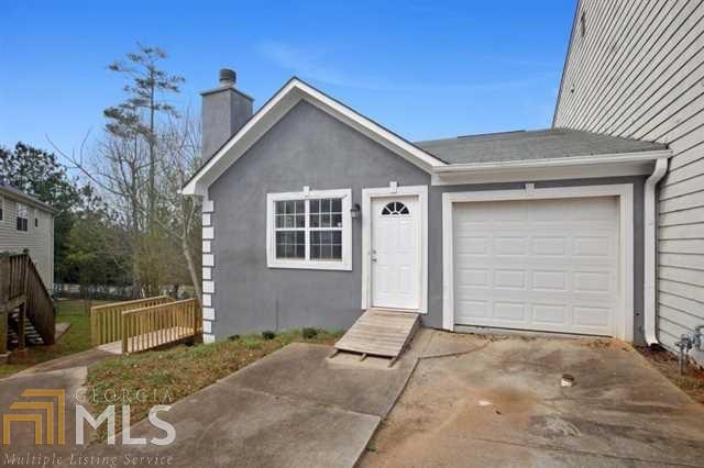 Don't miss out on this spacious end unit that has been completely updated inside and out. This home has 3 bedrooms and 2 baths on the main level with a large amount of extra square footage in the basement with a fully functional second kitchen and full bathroom. Basement does have its own exterior entrance so it would be perfect for an in-law suite or separate apartment. Updates include; engineered hardwood floors, carpet in all bedrooms and basement, kitchen cabinets and stainless steel appliances in both kitchens, and the exterior has been freshly painted.