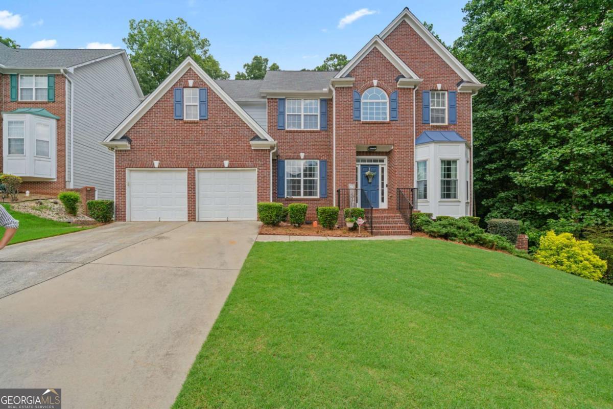 Welcome to your dream home! This stunning 6-bedroom, 3.5-bathroom residence offers a perfect blend of space, comfort, and modern amenities. With 5 full bedrooms on the second floor, there's plenty of room for family and guests. Step inside to find a newly updated kitchen featuring brand-new appliances, making meal prep a joy. The main level showcases beautiful hardwood and tile floors, complemented by fresh paint throughout, creating a bright and inviting atmosphere. The spacious living areas include a separate living room that can easily serve as an office, providing flexibility for your needs. The finished basement is a fantastic entertainment space, complete with a pool table and pre-plumbed for a sink, ideal for hosting gatherings or enjoying family time. Outside, you'll find a fenced-in backyard, perfect for privacy and play, along with a screened-in covered porch that invites relaxation and outdoor living. With a two-car garage, you'll have plenty of storage and parking space. This home is truly a must-see, combining modern updates with ample space for everyone to enjoy. Schedule a tour today!