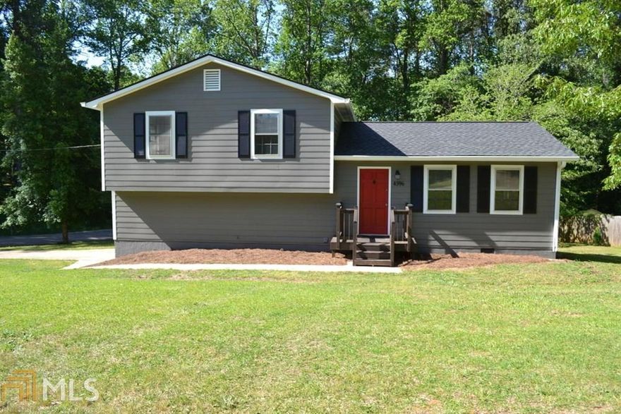 Nice starter home with great yard.  The word for this house is new.  It has a new roof, gutters, some windows, front porch, most of back deck, hardwood floors, vanities, sinks trim, light fixtures, and much more.  It sits in a nice spot in a well established neighborhood.
