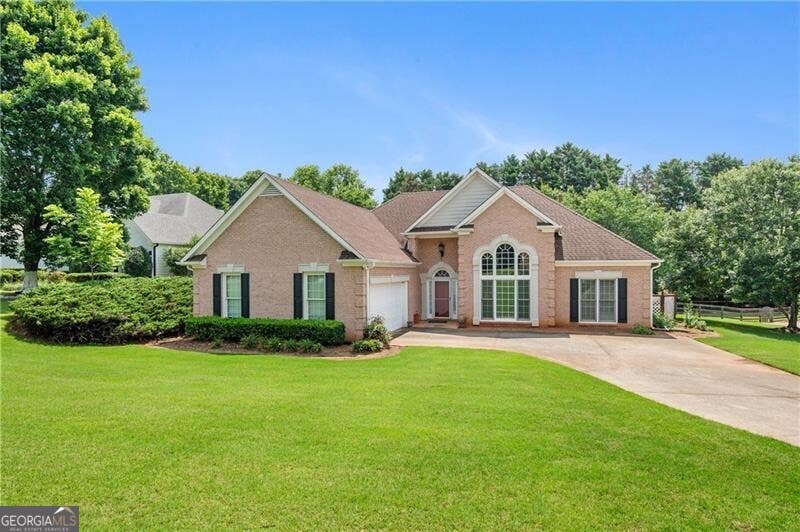 Photo of 6430 Tyler Way, Cumming, GA 30040 (MLS # 10825131)