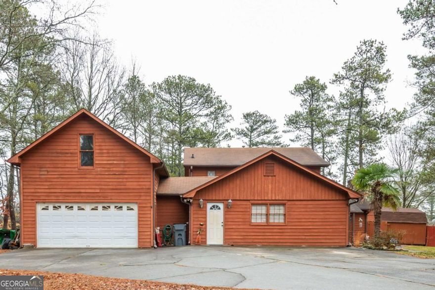 Don't' miss this great house on a large level lot with fenced backyard at the end of a cul-de-sac! Bedroom and full bathroom on the main floor. Upstairs are 2 additional bedrooms and 1 full bathroom and 1 half bathroom. OVERSIZED 2-CAR GARAGE with garage doors in the front and back. Also in the garage there is an entire room upstairs currently used for storage but could easily be turned into a bedroom or game room! Cozy family room with a stone wood burning fireplace insert. A sunroom is between the family room and backyard! The backyard also features a gazebo and storage building. New HVAC. SO MUCH POTENTIAL! HOA fee of $300 per year is voluntary. Optional additional Swim/Tennis fee is $200 per year. GREAT NEIGHBORHOOD AMENITIES! FLOORPLANS ARE IN THE PHOTOS!