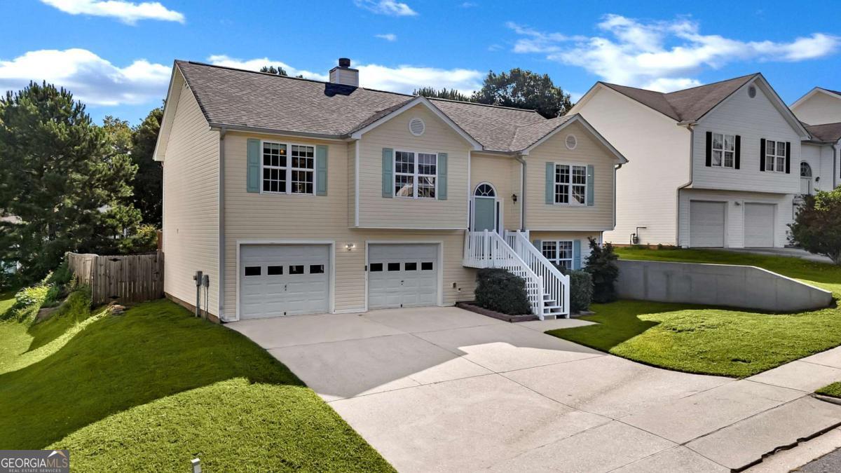 Spacious 4-Bed, 3-Bath with In-Law Suite - Move-In Ready & Priced to Sell! This large 1,695 sq. ft. home is priced to SELL and offers the perfect blend of space, comfort, and versatility. The main level features an open living room with a cozy fireplace, a bright kitchen, a dining area, a master suite, two guest bedrooms, and two full baths. Downstairs, the private in-law suite includes its own living area, bedroom, bath, and partial kitchen-ideal for guests, extended family, or house-hacking! Fresh paint throughout makes this home completely move-in ready. Enjoy the outdoor deck, fenced backyard, and convenient location near schools, shopping, and dining.