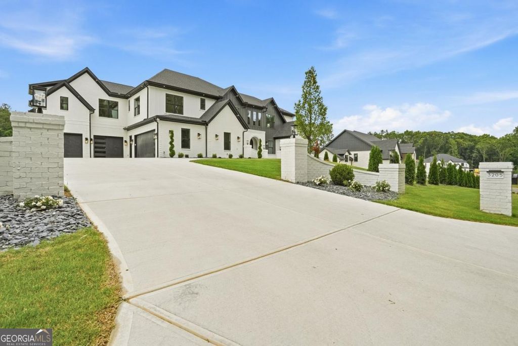 Photo of 3205 Thompson Mill Road, Buford, GA 30519 (MLS # 10782305)