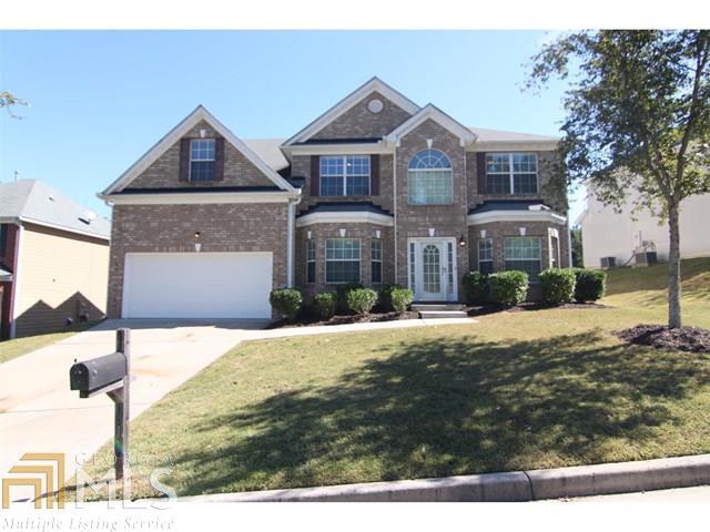 RENOVATED & MOVE IN READY! Great curb appeal; The home has 4 beds/3 full baths; downstairs bonus could turn into a guest bedroom with door. 2nd stairway to access OVER-SIZED Master bedroom from Great room, mstr bath with his/her closets and double vanity, secondary bedroom with trey ceilings, gleaming hardwood floors in kitchen & great room w/fireplace. Updated kitchen with granite counter top, stainless steel appliances, island and breakfast area. Gorgeous Complete Renovated home with updated lighting and plumbing fixtures throughout. Make your offer today!