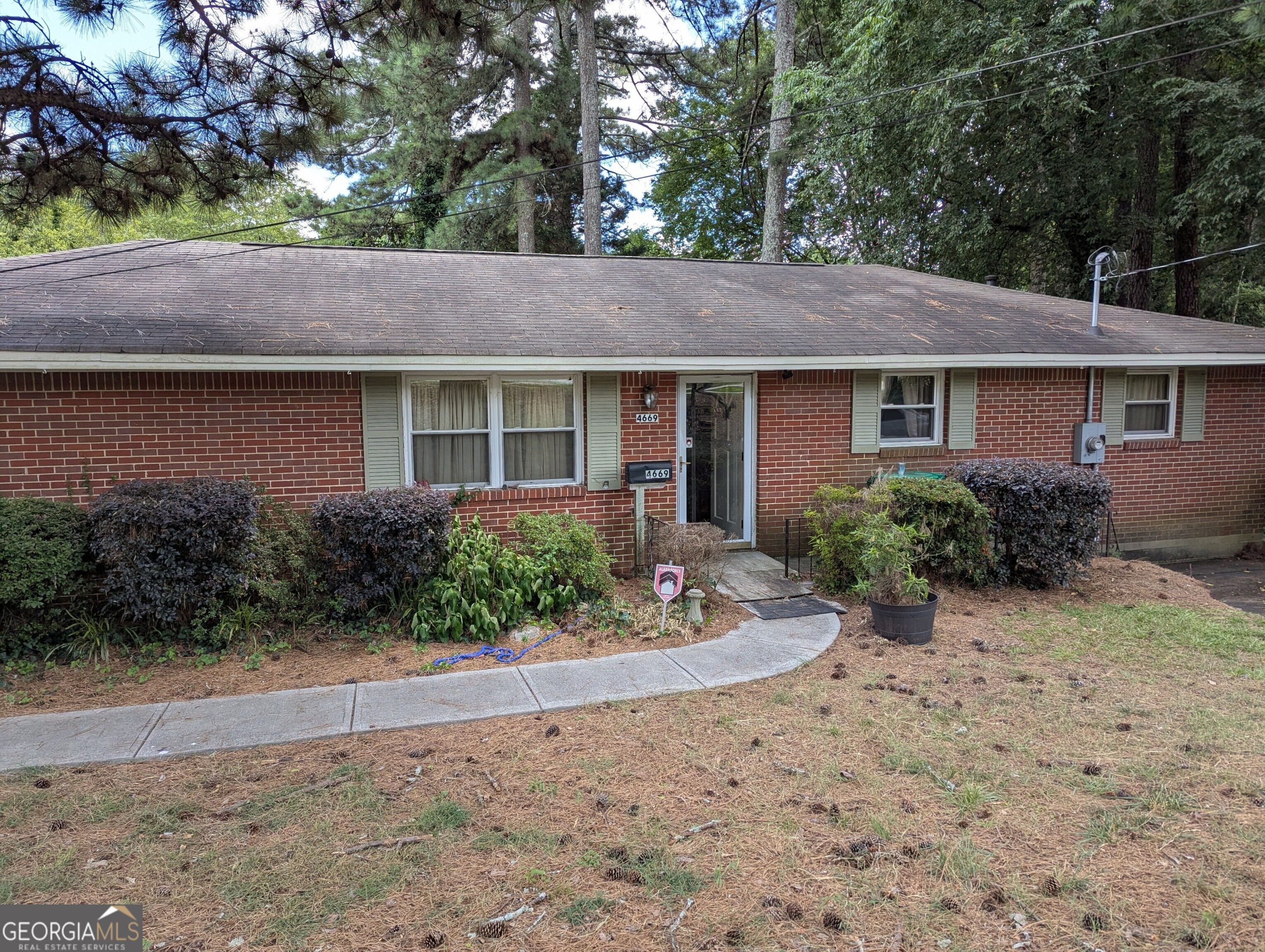 This ranch home is ready for your vision or new development and has great potential in the growing and desirable City of Tucker. Large corner lot with driveway on the neighborhood street rather than Lawrenceville Hwy. Multiple choices through neighborhood for accessing the main rd. The options here to renovate the existing home, new construction or potential commercial or all on the table for you. Don't miss this opportunity! The current floor plan inside is open to design or current configuration with living room, dining, separate den with freestanding gas flue f/p, large kitchen with attached laundry room, 3 bedrooms and 1 bathroom. The laundry rear door exits to a covered screened porch on deck and spacious back yard. This area could easily be converted into a 2nd bathroom through den. Drop down walk-in crawl space. Property being sold "As Is".