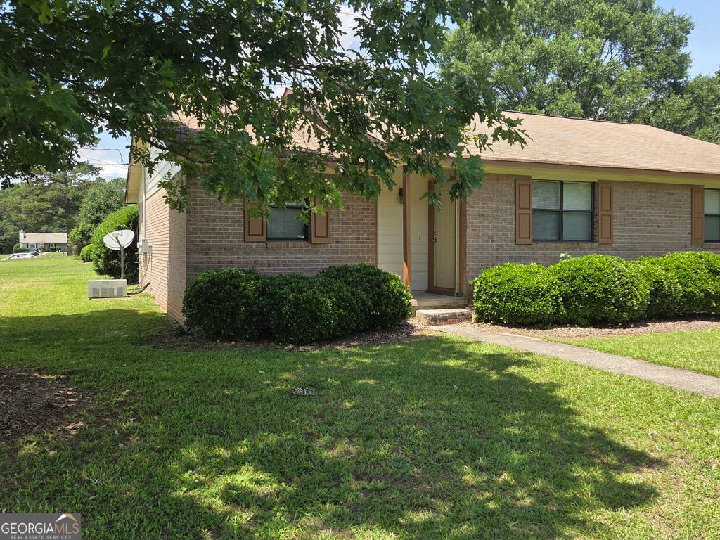Photo of 8437 Pineland Drive, Jonesboro, GA 30238 (MLS # 10780899)