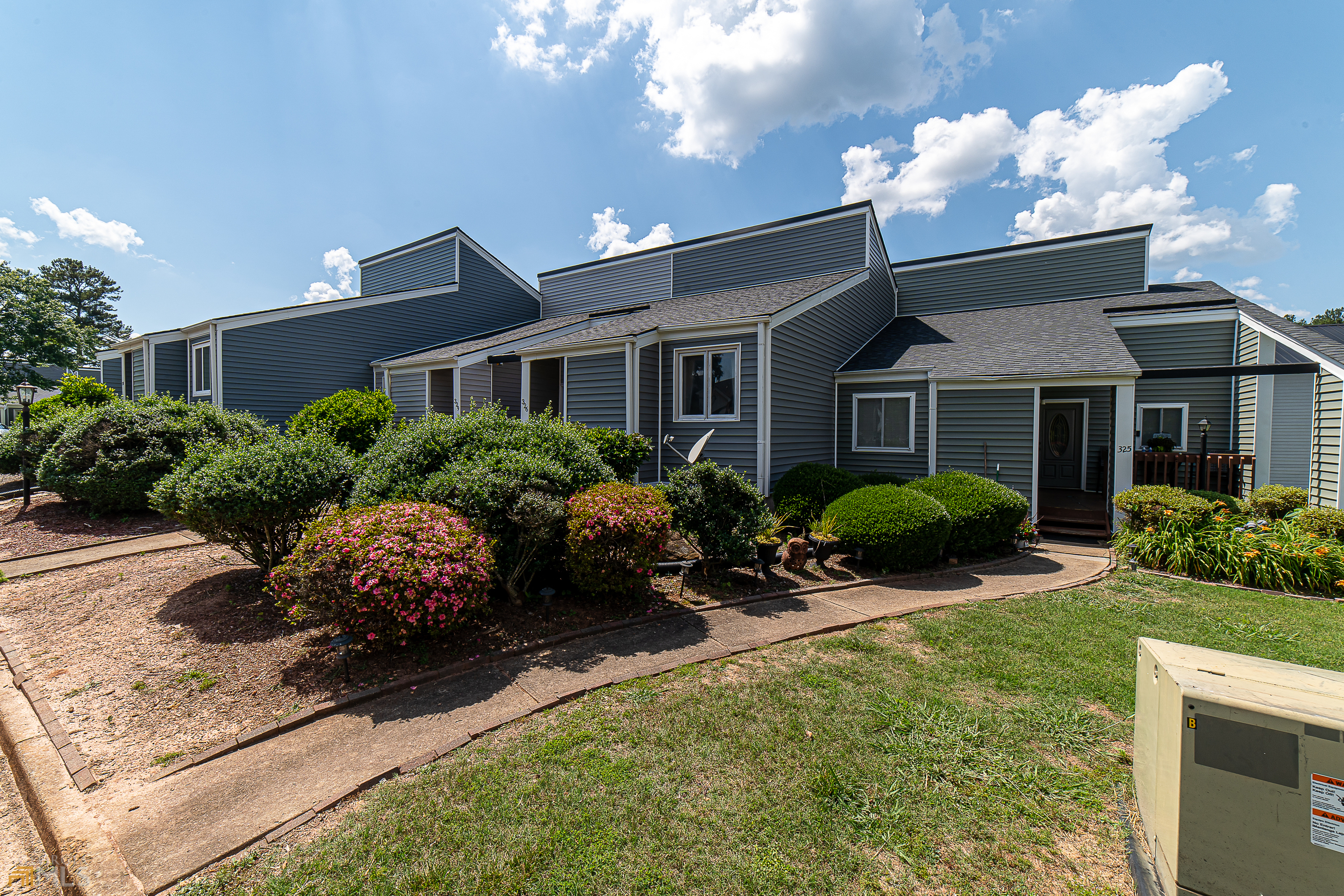 Come on in and fall in love with this incredibly custom 2/2 in a private gated lakeside community with so much to love! Boasting MANY major new components and custom finishes, this unit has new gutters, roof, siding, and massive double decks that are ready for you to soak in some sun and enjoy the views this unit offers of the beautiful, Lake Tara! With so many custom touches, youare going to love, the stacked stone wall in the dining room and the gorgeous custom tile shower/tub combo in the primary bedroom - just a few touches that will immediately catch your eye! Fall asleep steps from this beautiful body of water and wake up ready to enjoy the scenery day after day just steps away from your own private lake access with the ability to install your own private dock! This community offers amenities that are ready for you to enjoy this summer and everything you need to do that is right here!