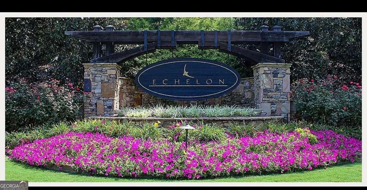 Only a few remaining lots for sale in Echelon, an exclusive gated golf club community in Alpharetta, situated just across the North Fulton line in Cherokee County. Lot 11 is a premier site as it sits at the highest point of the entire landscape. 1.49 acres including ARC approved architectural drawings (optional) consisting of a 10,138 sq. ft. design , 4 bedrooms, 6 bathrooms, 3 car garage and an indoor pool! The $20,000 drawings are currently pending approval from the Cherokee County Building Department This serene and upscale neighborhood is characterized by rolling hills, breathtaking views, and stunning sunsets. This prime homesite, one of the few remaining, You have the opportunity to bring your own plans and builder subject to approval through the Architectural Review Committee (ARC). Optional golf and tennis memberships are available, allowing you to enjoy the community's premier amenities. Echelon offers easy access to Avalon in Alpharetta, Halycon in Forsyth County, and Crabapple Crossroads, providing convenience and connectivity. Don't miss the chance to build your dream home in this prestigious and tranquil setting.