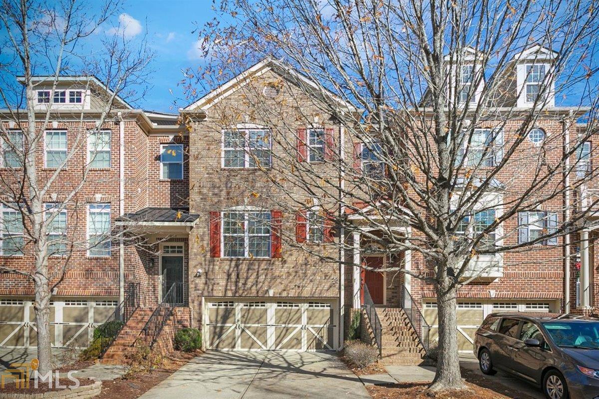 Fabulous, move-in ready home in great location! 3BDR/2.5Bath, Open Floor plan w/hardwood floors on main. Spacious gourmet kitchen with granite c/tops, stainless steel appliances, breakfast area and elegant formal dining room. It opens to grand family room with cozy fire place, sitting area and double doors, leading out to outdoor area, perfect for relaxing and entertaining. Expansive master retreat has vaulted ceilings and walk in closet. Master bath has dual vanities, separate shower and soaking tub. Unfinished Daylight basement with endless opportunities for future gym, office or spacious in-law suite with private access to outdoor patio. All areas are surrounded by beautiful, wooded, private views. Belongs to best schools, easy access to Ga 400. This is an incredible opportunity to own such a fabulous home.