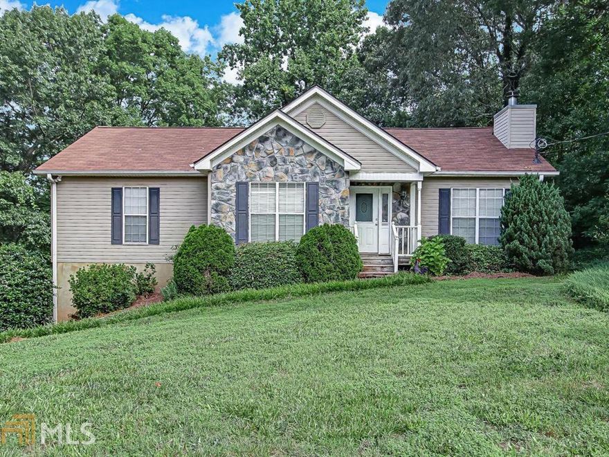 Welcome to this well-maintained spacious 3BD|2BA Ranch on full basement in the Chestnut Mountain area. Renovated stylish kitchen features sparkling granite & white cabinets. Bright kitchen boasts breakfast area with walk out access to deck overlooking private backyard. Vaulted great room makes a statement with floor to ceiling stone fireplace & gleaming hardwood floors. Primary suite offers tray ceiling, separate tub|shower & large walk in closet. Offering "Move In" package including refrigerator & washer + dryer. Unfinished basement perfect for future expansion. Fabulous lot with mature trees & deck for entertaining makes the perfect outdoor living space. Low maintenance siding. No HOA fees. This home is immaculate!