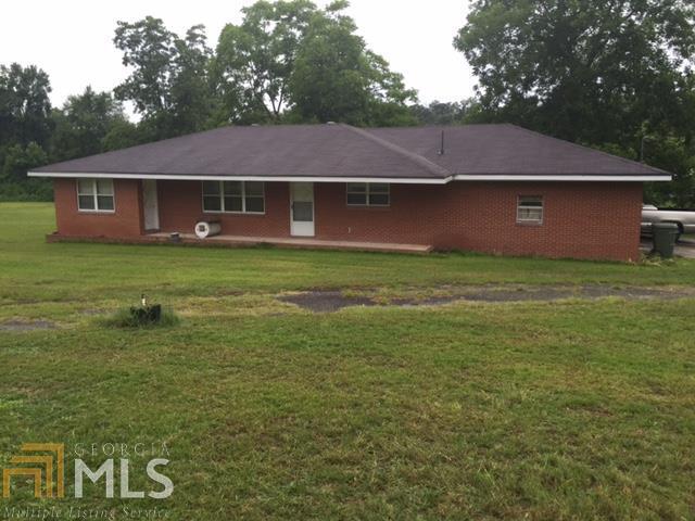 Great brick home in historic downtown Gordon. This 3 bedroom 2 bathroom home sits on over an acre and has a workshop that is wired and plumbed!! Convenient to Macon and Milledgeville. Priced to sell, a terrific starter home or move up buyer!