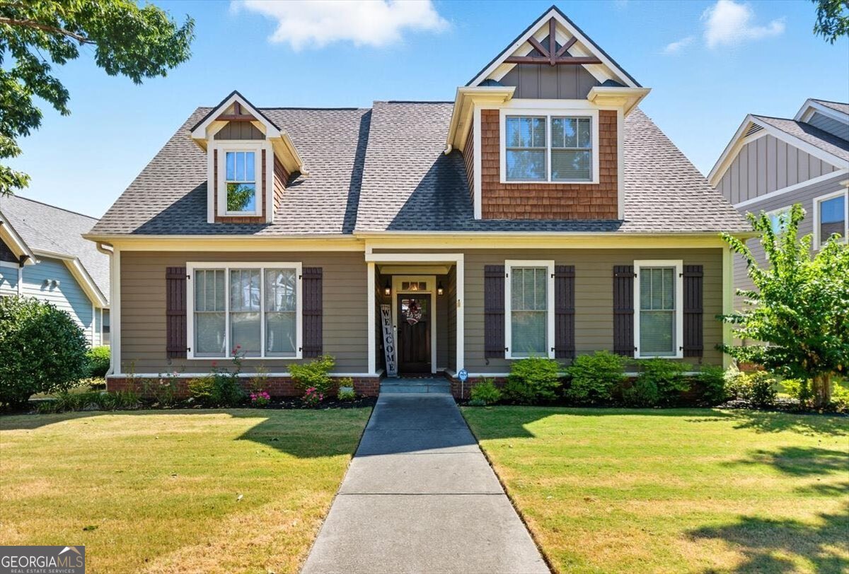 Don't Judge a Book by Its Cover - This Home Will Surprise You! Step inside and prepare to be amazed! This incredibly spacious 4-bedroom, 3-bath home offers more than meets the eye. With a master suite on the main level, updated LVP flooring upstairs, and an open, airy layout filled with natural light, every inch of this home feels welcoming and functional. The kitchen boasts brand-new stainless steel appliances, perfect for home chefs and entertainers alike. A new HVAC system ensures year-round comfort, and the 5-year-old water heater adds peace of mind. Storage is no issue here - there's room for everything and everyone with potential to make the unfinished storage room a finished space. You'll also love how well this home has been cared for, making it truly move-in ready. Located in a sought-after, family-friendly neighborhood, you're just steps away from shopping, dining, and even a local school - it doesn't get more convenient than that. Plus, enjoy quick access to the community pool and two beautiful ponds where residents can fish. This is the perfect location, the perfect home, and a rare opportunity you won't want to miss!