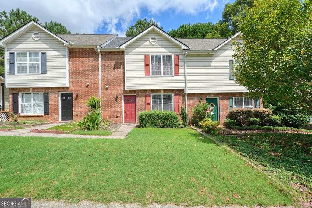Don't miss this move in ready, UPDATED and charming two-story Townhome in Hutchinson Pointe (Location, Location, Location). This 2-bed, 2.5-bath residence features a new roof, new HVAC, a beautifully upgraded kitchen with white cabinets, stainless steel appliances, and quartz countertops, fresh paint and new flooring. Enjoy the spacious master bedroom with cathedral ceilings, and a walk-in closet. The property includes a one-car carport, an extra parking space, a storage unit, and a private fenced backyard with a large patio. The family-friendly Hutchinson Pointe community offers a swimming pool, tennis courts, a playground, greenspace and walking trail. This immaculate renovated townhome is located in the vibrant Cumming area, with easy access to top-rated schools, parks, dining and shopping. Hospital is nearby. Easy access to GA 400 & SR 20 and much more...