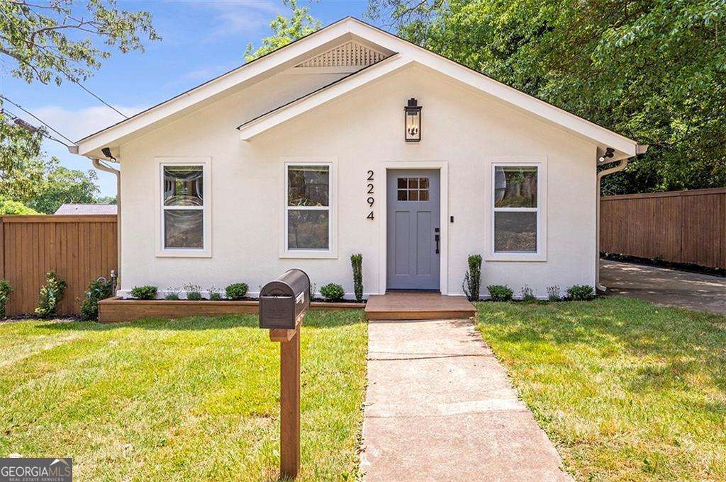 Where Modern Design meets Prime Location! Step into this four-year old beautifully designed 3-bedroom, 2-bathroom home, with modern style and everyday comfort. Built in 2021, this turn-key, move-in ready gem features an open-concept kitchen with quartz countertops, stainless steel appliances, and beautiful tile accents, offering seamless sight lines to the family room and dining area-perfect for entertaining. Vaulted ceilings and hardwood floors add a touch of elegance throughout. Situated on a corner fenced lot, this home blends privacy with convenience. With a new main sewer line and original exterior walls, it offers both charm and peace of mind. Plus, enjoy effortless access into the city in minutes! Property qualifies for 100% financing with NO MI, no income qualifier, and closing costs assistance with preferred lender. Don't miss out on this incredible opportunity!
