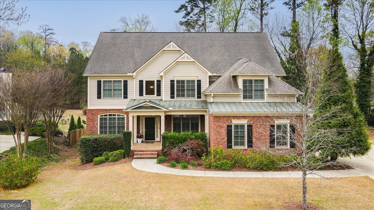 Location! Location! Location! Just minutes from the esteemed Mount Paran Christian School and conveniently close to I-75, I-575, Historic Marietta Square, and vibrant Kennesaw, this meticulously maintained residence perfectly blends luxury with convenience. Quietly nestled in Towneside SquareCoa quaint, private enclave of just 19 executive homesCothis gem awaits you. A long driveway leads to a side-entry three-car garage, enhancing curb appeal and convenience. Step into luxury as you enter the bright, airy, two-story foyer, showcasing elegant, hand-scraped Virginia hardwood flooring that extends throughout the main level. The open floor plan effortlessly accommodates modern lifestyles, boasting a dedicated office, formal dining room comfortably seating 12+ guests, and a conveniently located bedroom with a full bath on the main floor. The stunning kitchen is both sophisticated and functional, featuring ebony cabinetry, granite countertops, a stylish tile backsplash, stainless steel appliances, and a striking ivory island. Adjacent is a charming breakfast room and a classic fireside keeping roomCoperfect for cozy mornings or relaxed evenings. The sun-filled family room is highlighted by a beautiful coffered ceiling, custom built-in bookshelves, and a cozy fireplace, offering warmth and elegance. Step outside onto the deck, where you'll overlook a private, wooded lot; your peaceful retreat. Upstairs, you'll discover five spacious bedrooms and a versatile flex room ideal as a playroom, homeschool room, media room, or library. The expansive primary bedroom suite is a true sanctuary, featuring an oversized layout, tranquil sitting area, generous his-and-her closets, and a luxurious bathroom complete with a peaceful soaking tub, separate shower, dual vanities, and stylish tile flooring. Secondary bedrooms are generously sized with ample closet space. The expansive, unfinished basement offers over 2,000 square feet of endless possibilities for customization, additional living areas, or ample storage. Situated on a quiet cul-de-sac, this property ensures both peace and privacy, making it a truly exceptional find.
