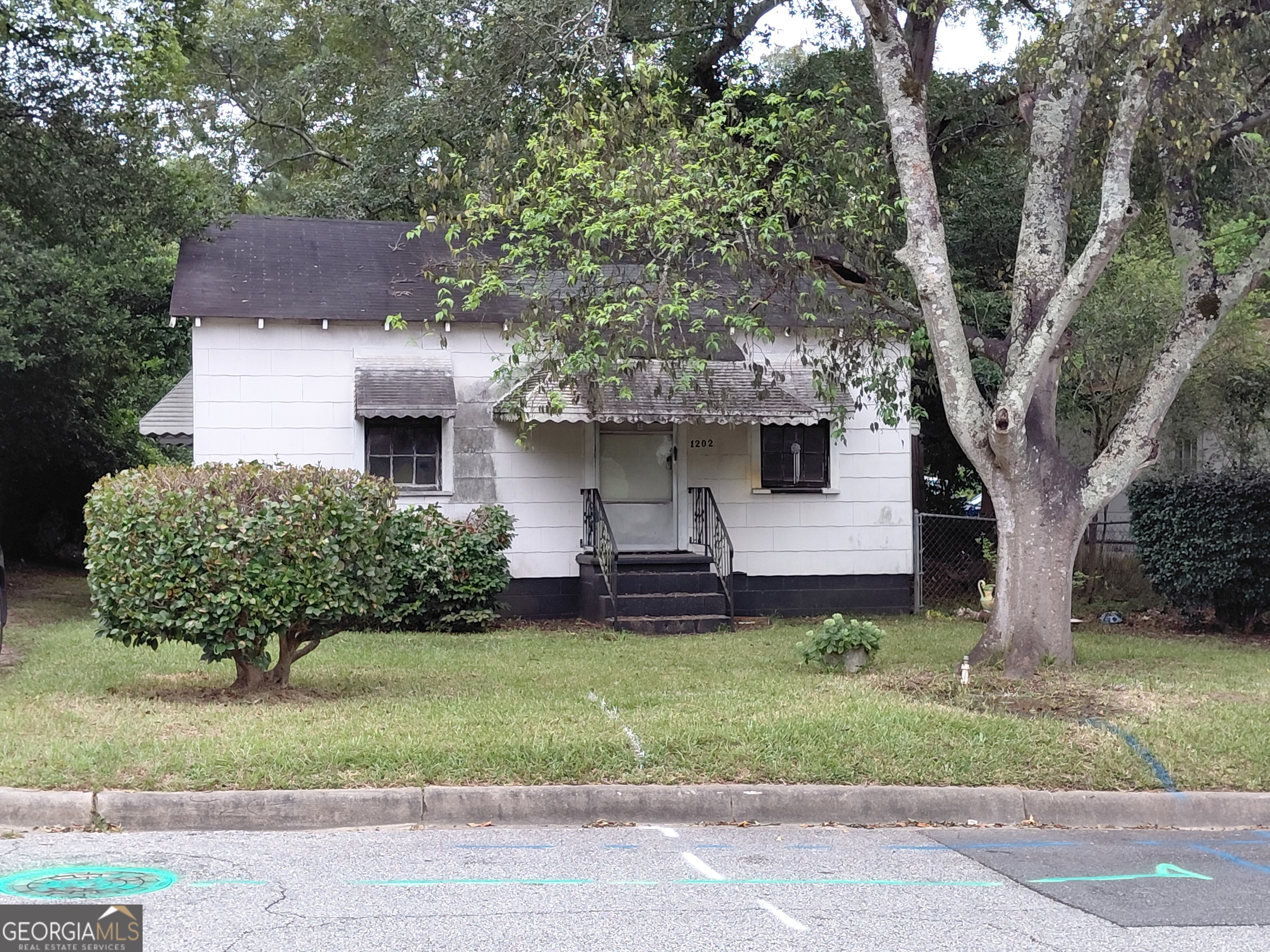 Dreams are possible. Transform this 2 bedroom house into a get away spot or renovate to make it a nice place for a rental or first home. Large enclosed backyard for your friends, family & animals to enjoy the outdoors. Markings are in place to change the septic to city sewage. Sold as is & cash only. Make an offer today.