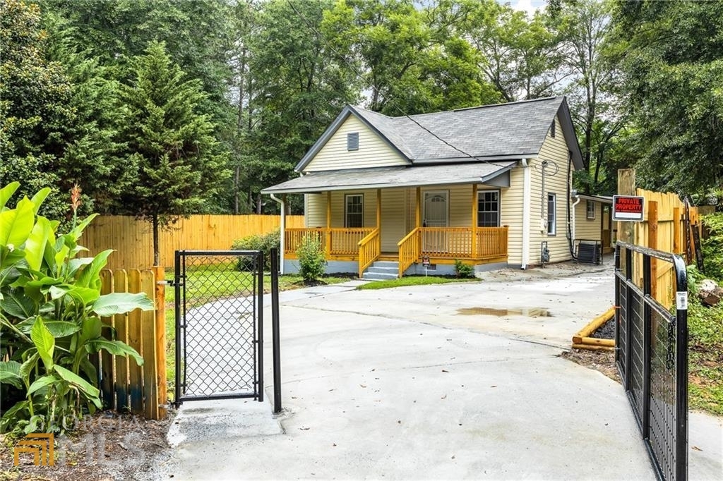 Enjoy Southern charm with a front porch in this totally updt hm featuring newer windows, newer siding, newer roof , newer flooring throughout and newer driveway. 3 Brs and 2 baths w Eat in kitch & newer stained cabinets and newer SS appliances. Newer water heater & HAVC. Newer plumbing fix & light fix. Enjoy the privacy of a new fenced yard that is landscaped and being the last hm on the st. Actual square foot is larger than tax.