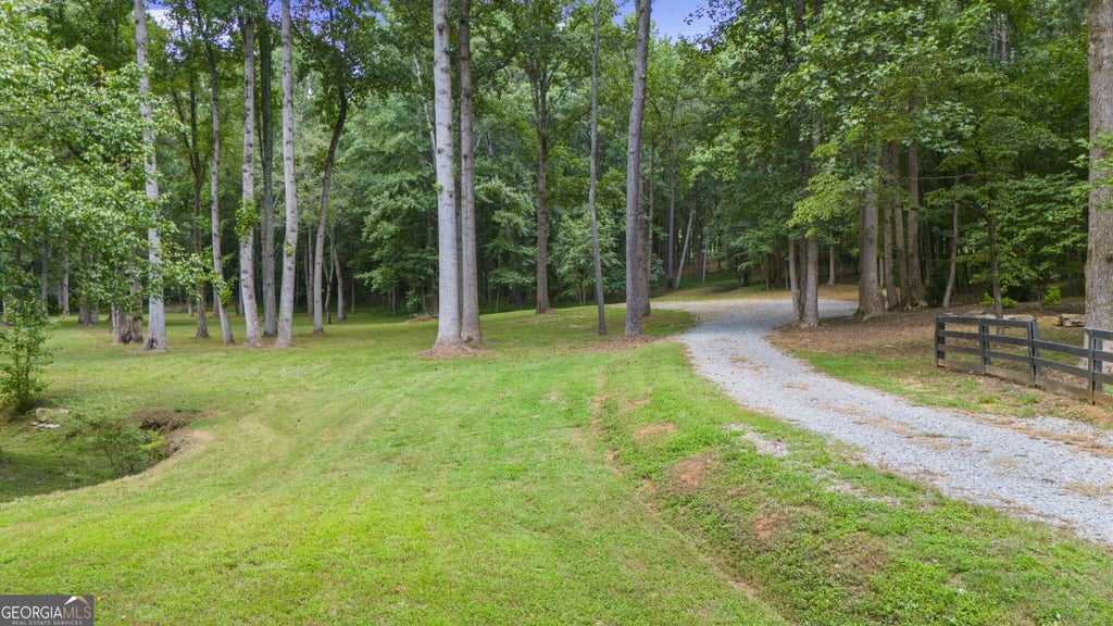 Photo of 383 Liberty Grove Rd, Alpharetta, GA 30004 (MLS # 10836517)