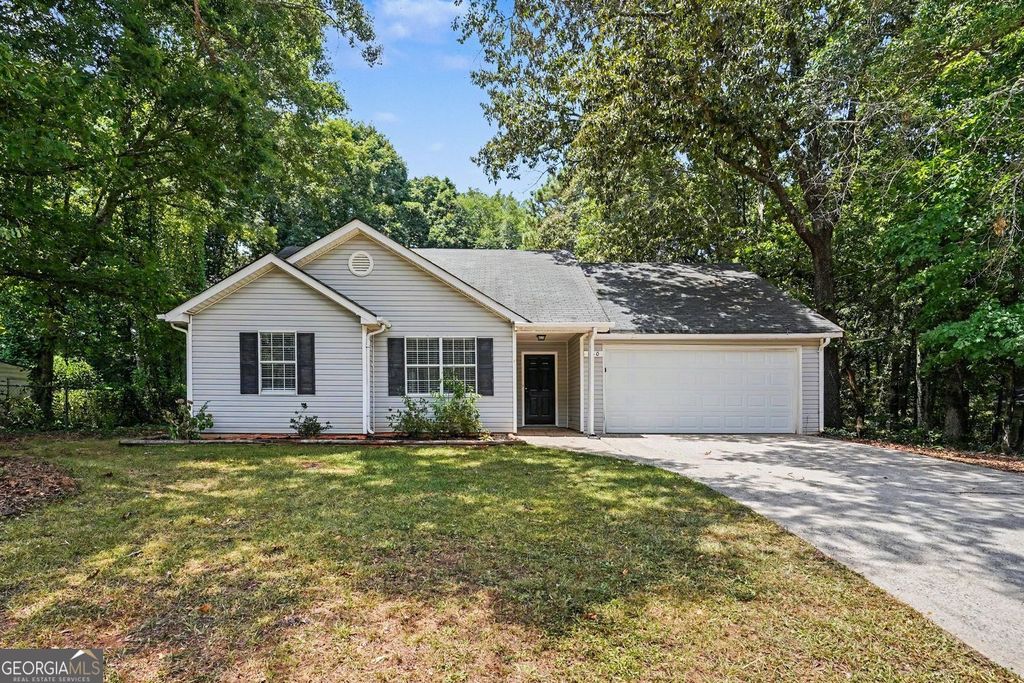 Photo of 560 E Country Woods Drive, Covington, GA 30016 (MLS # 10806423)