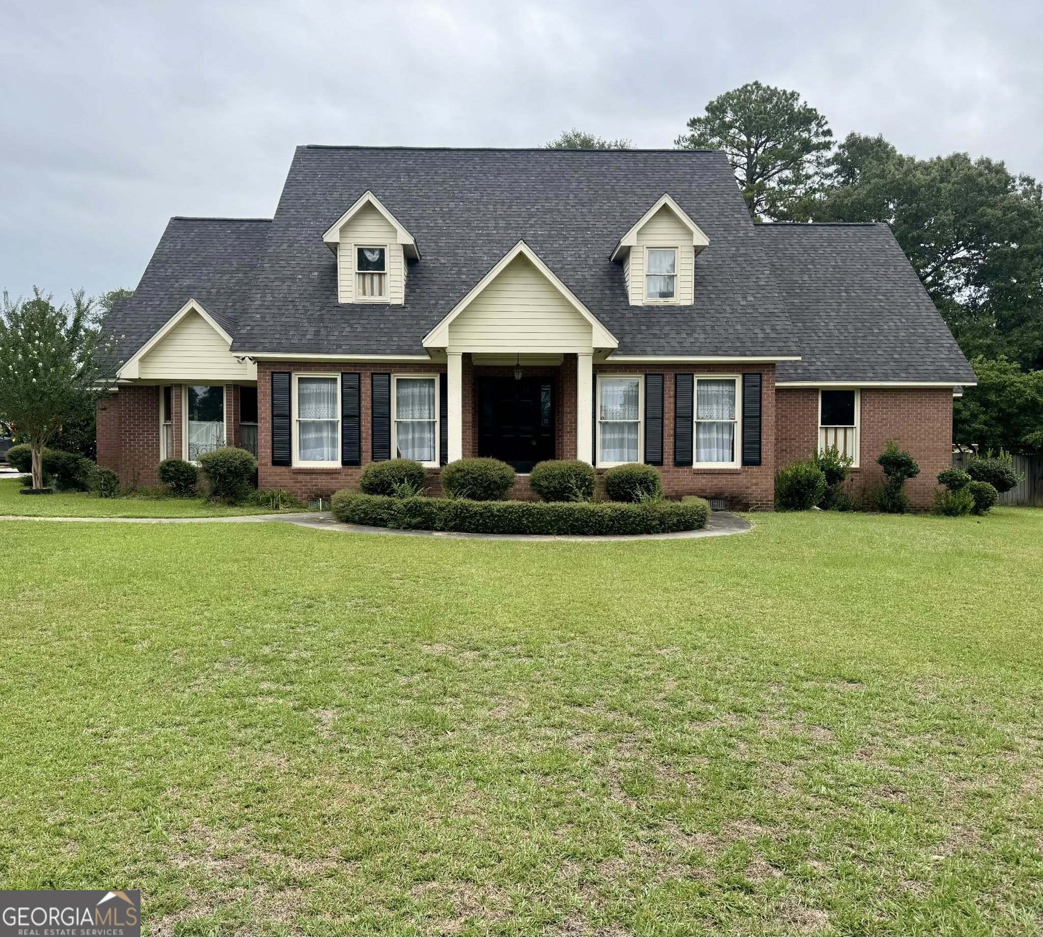 Well-built brick home featuring 4 bedrooms, 3.5 bathrooms, a large bonus room, office, and formal dining room-perfect for both work and entertaining. Downstairs you will find two bedrooms and two bathrooms. A large primary bedroom with ensuite bathroom with double sinks, tub, shower, walk-in closet, and storage/linen closet. Upstairs you will find two spacious bedrooms with walk-in closets, jack and jill bathroom, and a bonus room. Large floored attic space that could be finished out. Enjoy the convenience of a 3-car garage and luxury of an inground pool with exterior half bath in a fenced back yard. Pool liner is around 2 years old. Sizable home that is big enough for the whole family, great for entertaining, and is ready for a new owner's touches. Great location in town and close to all amenities.