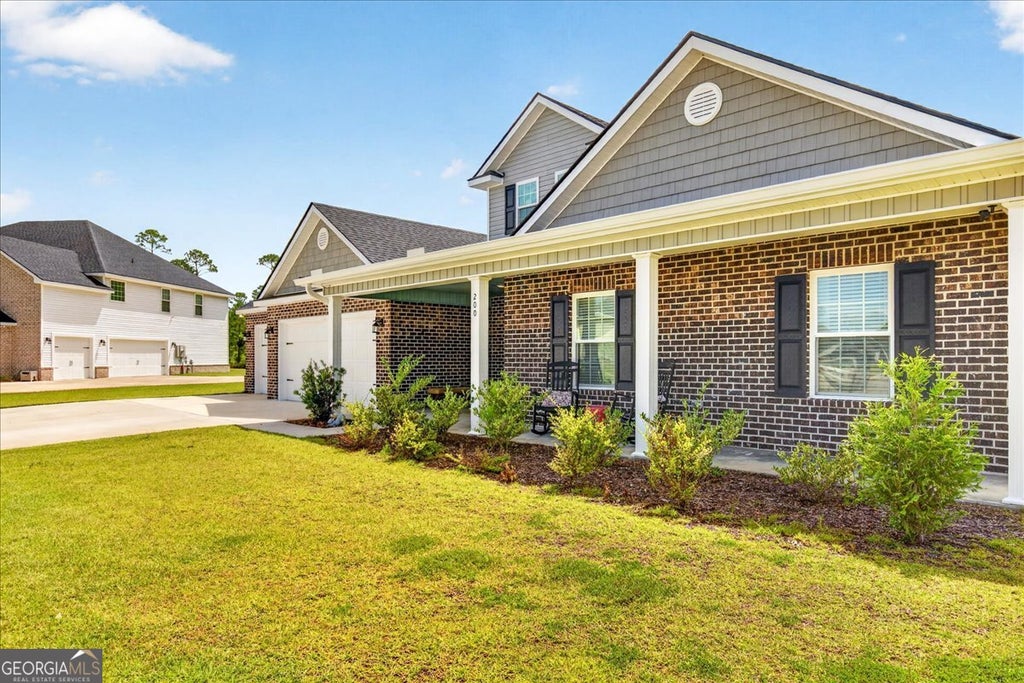 Photo of 200 Baker Field Lane SE, Ludowici, GA 31316 (MLS # 10800000)