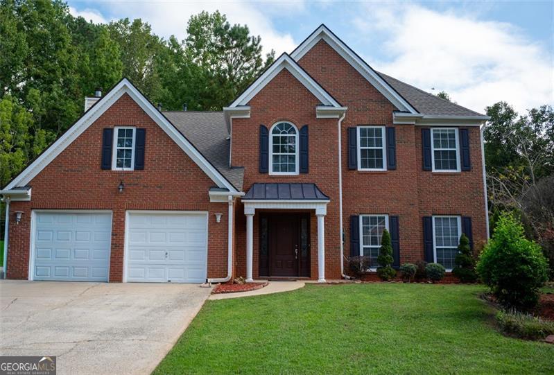Welcome to 436 Two Iron Trail! This beautiful 4 bedroom, 2.5 bath home has been recently renovated and is move-in ready! Located in a gorgeous neighborhood off Cobb Parkway, you can enjoy peace and serenity while only minutes from downtown Kennesaw and Acworth! The stylish kitchen comes with all necessary appliances so moving in is as stress-free as possible! The backyard is fully fenced in and features a large patio for all of your outdoor entertainment needs. One garage spot has been converted into an office, however this feature is reversible if desired. The large open concept living room provides for a relaxing space to unwind, while separate formal dining and living rooms are present for when company is over! This wonderful home is ready to go and needs nothing!